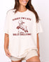 Woman wearing natural color shirt with 'Sorry I'm Late I Was Dilly Dallying' graphic design